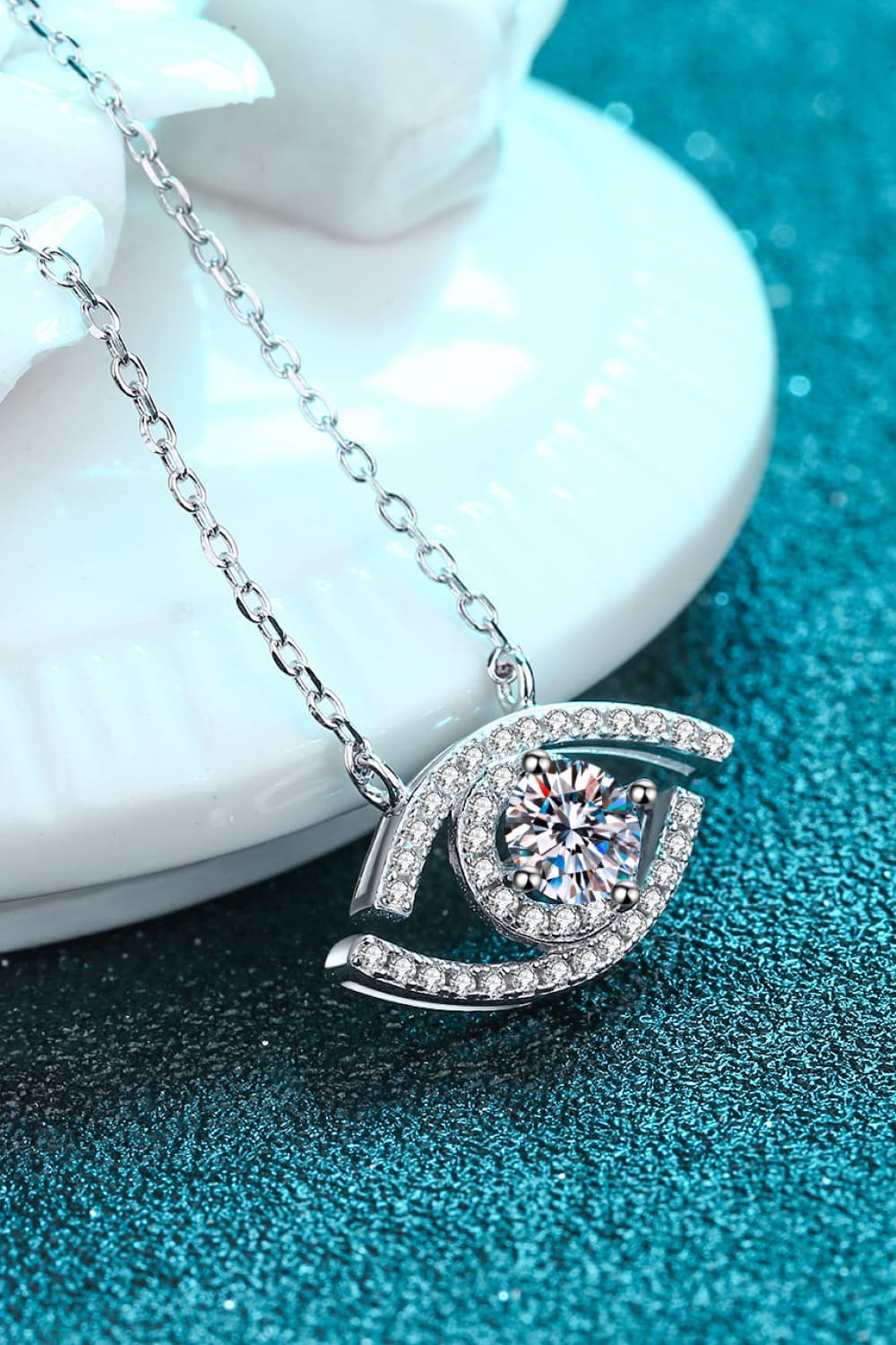 Moissanite Evil Eye Pendant Sterling Silver Necklace on display