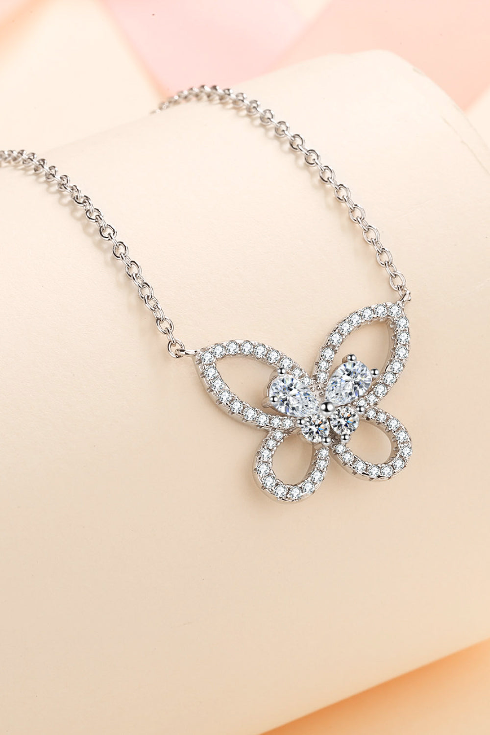 Moissanite Butterfly Pendant Necklace on display