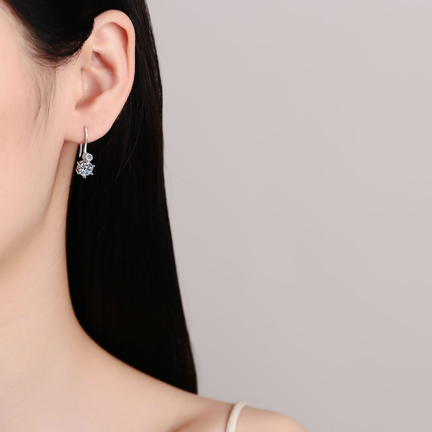 2 Carat Moissanite Sterling Silver Earrings on ears