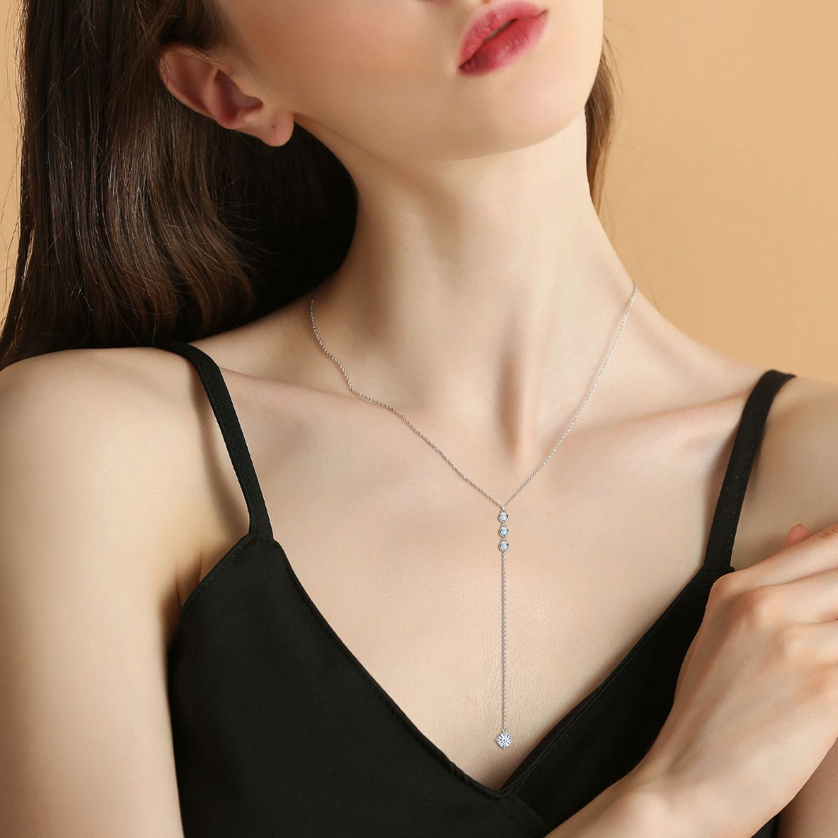 1.3 Carat Moissanite Sterling Silver Drop Necklace around neck