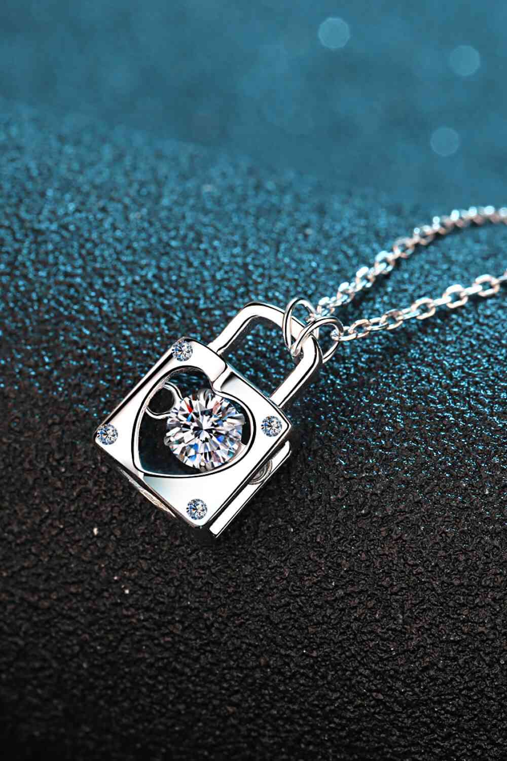 Adored Moissanite Lock Pendant Necklace on display