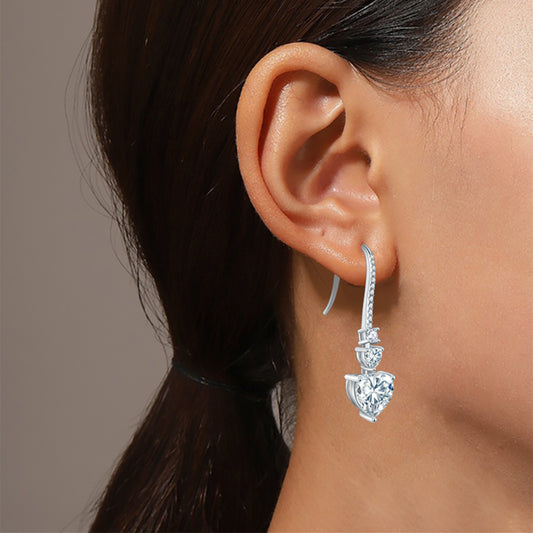 5.44 Carat Sterling Silver Moissanite Heart Drop Earrings on ears