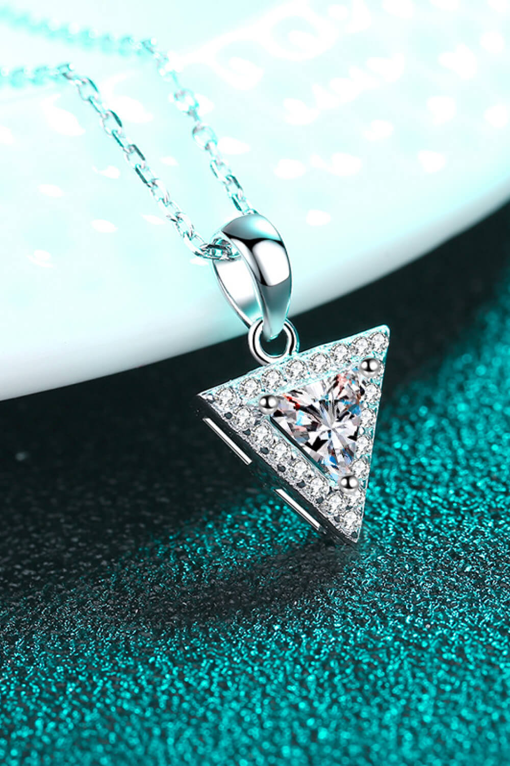 Sterling Silver Triangle Moissanite Pendant Necklace on display