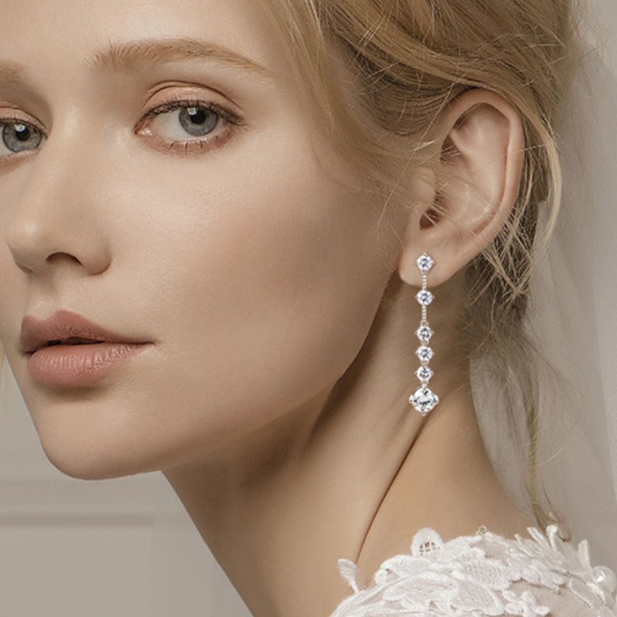 4 Carat Moissanite Sterling Silver Earrings on ears