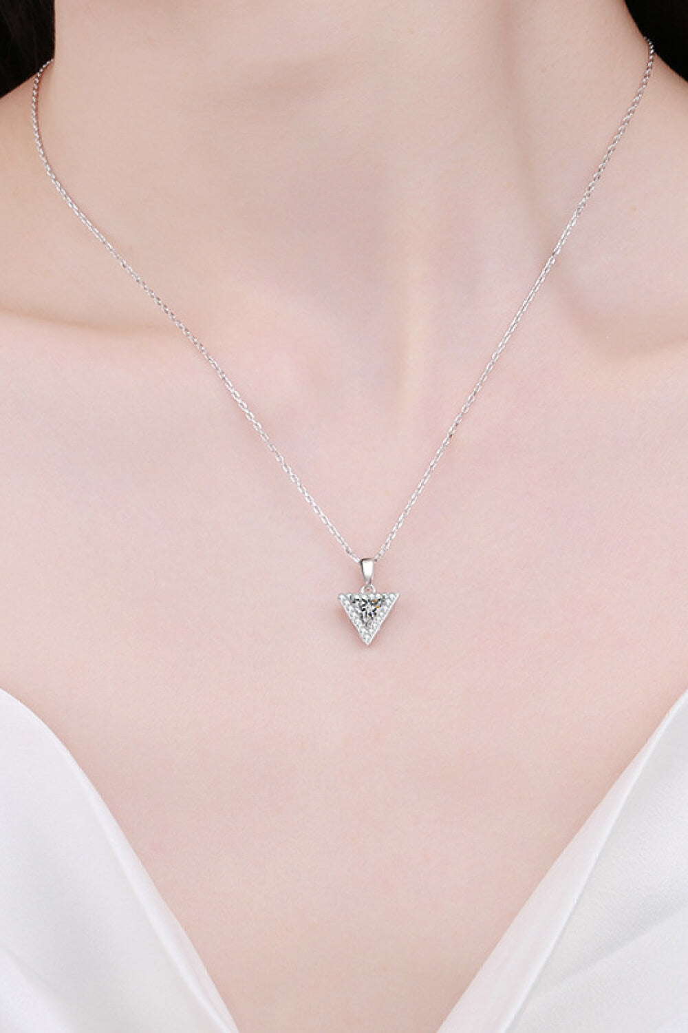 Sterling Silver Triangle Moissanite Pendant Necklace around neck