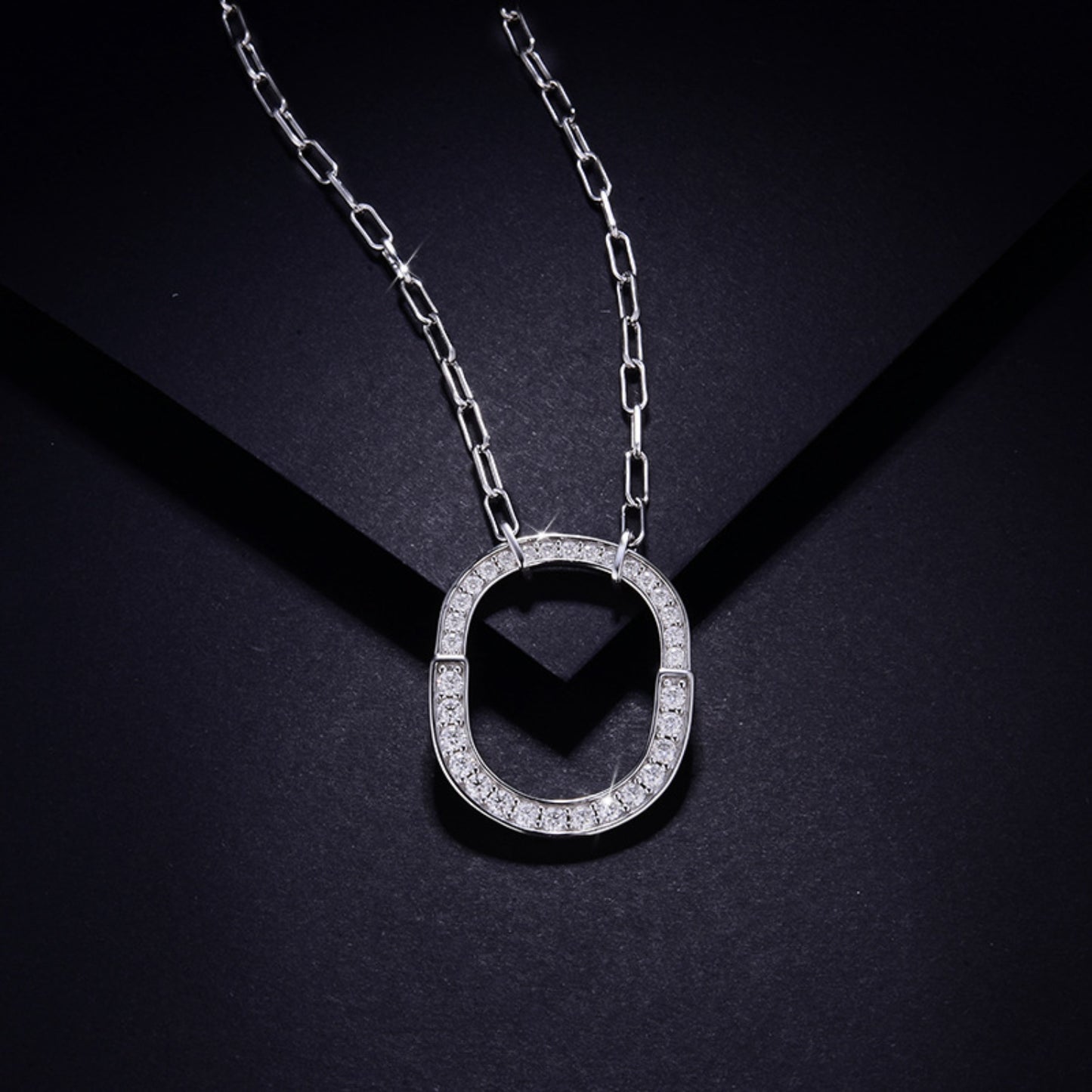 925 Sterling Silver Inlaid Moissanite Pendant Necklace on display