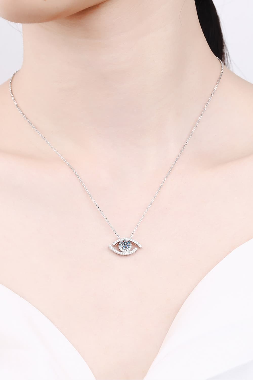Moissanite Evil Eye Pendant Sterling Silver Necklace around neck