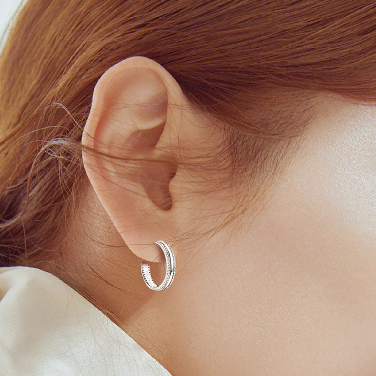 Sterling Silver Inlaid Moissanite C-Hoop Earrings on ears
