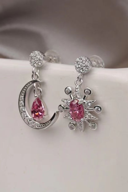 2 Carat Moissanite Sterling Silver Moon & Star Earrings on display