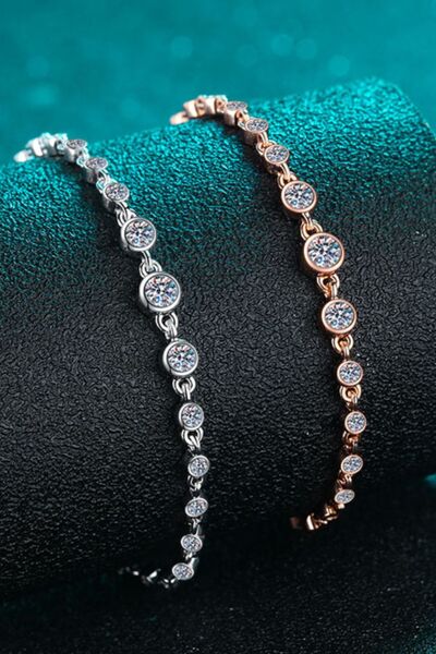 925 Sterling Silver Inlaid Moissanite Bracelet and copper bracelet display both