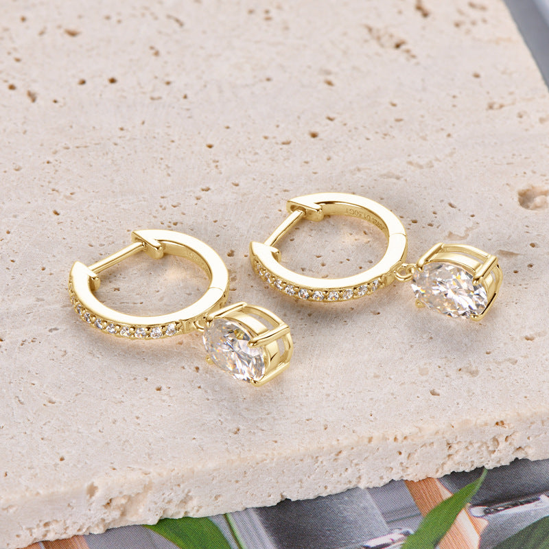 3 Carat Moissanite 18K-gold-plated earrings on display
